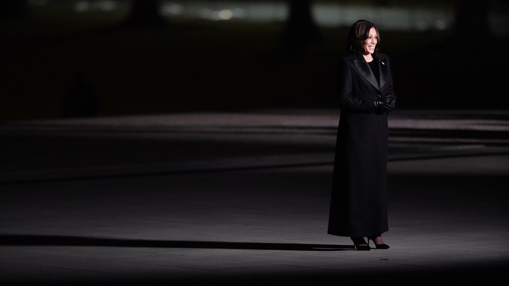 Kamala Harris wearing a black coat