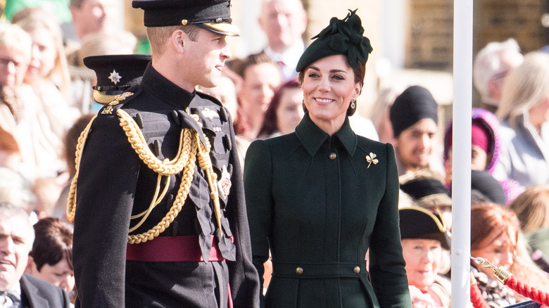 Kate Middleton wearing a green coat