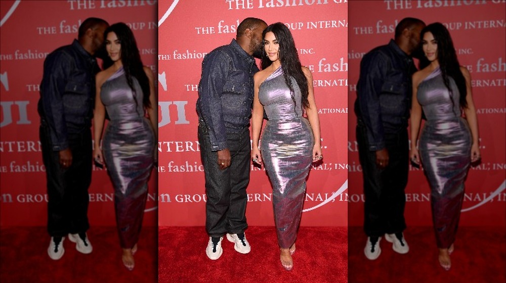 Kim Kardashian in an iridescent dress with Kanye West