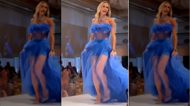 Lara Trump walks the runway in a blue chiffon gown