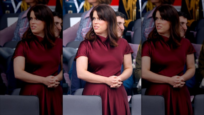 Princess Eugenie standing in red dress 