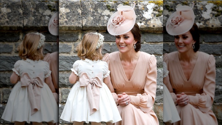 Kate Middleton smiling at child