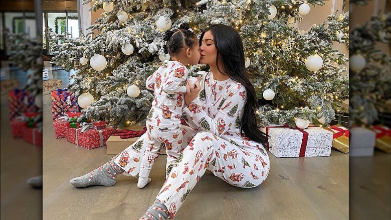 Stormi Webster and Kylie Jenner posing