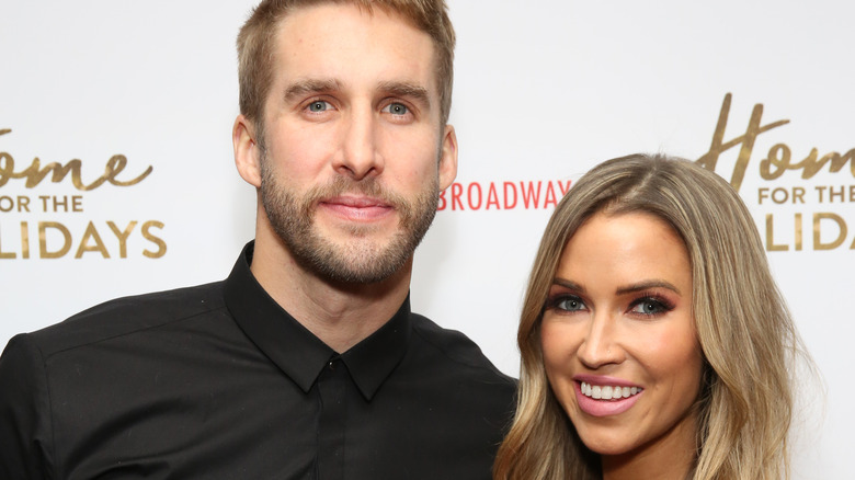 Kaitlyn Bristowe and Shawn Booth at an event. 