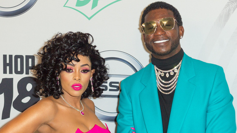 Keyshihia Ka'Oir and Gucci Mane attending an event