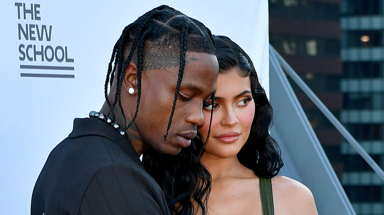 Travis Scott and Kylie Jenner posing 