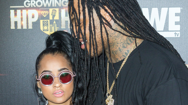 Waka Flocka Flame smiling at Tammy Rivera