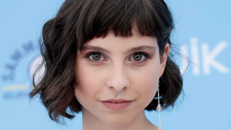 Ludovica Francesconi in front of blue background