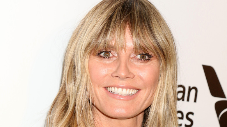 Heidi Klum smiles on red carpet