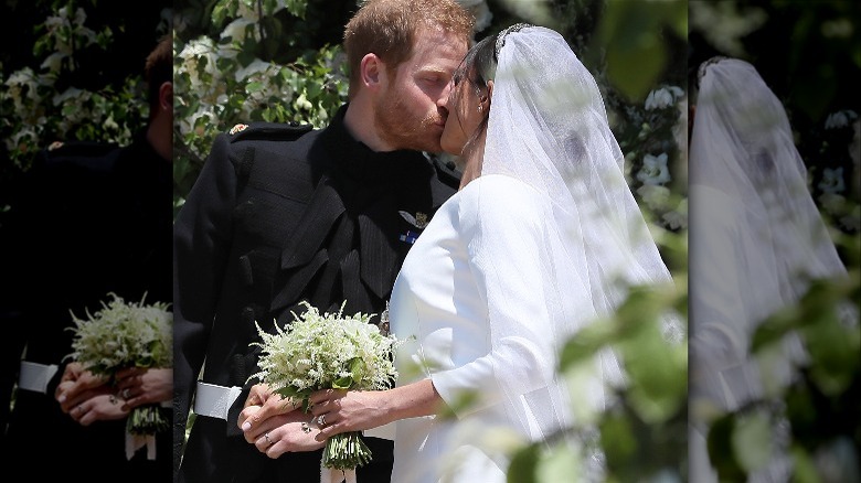 Meghan Markle kissing Harry at wedding