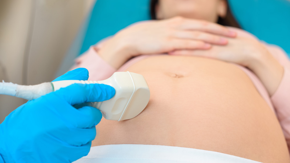 Woman getting an ultrasound from an OB/GYN