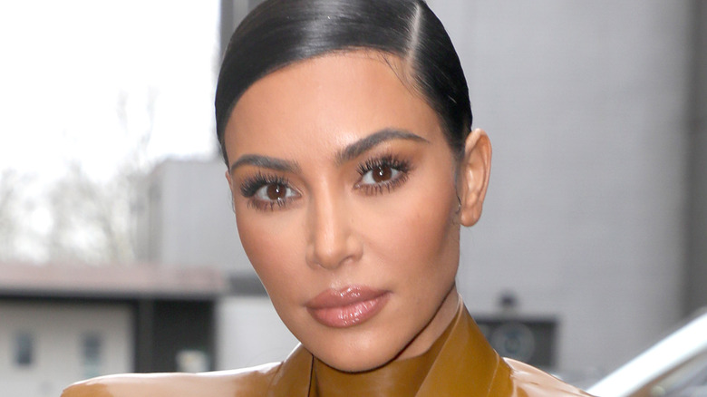 Kim Kardashian street style with natural brows