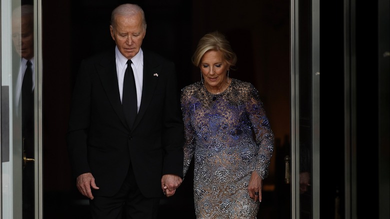 Jill and Joe Biden holding hands