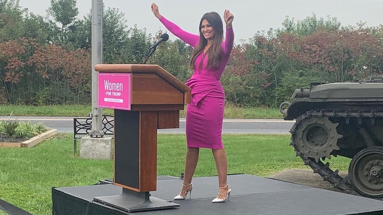 Kimberly Guilfoyle in pink dress at Women for Trump