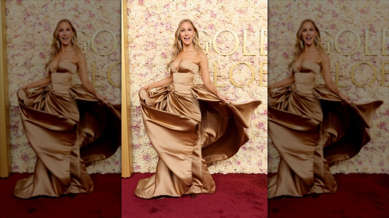 Nicki Glaser twirls in a gold dress at the Golden Globes