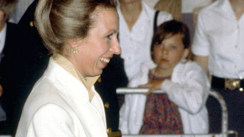 Princess Anne wearing ivory, smiling