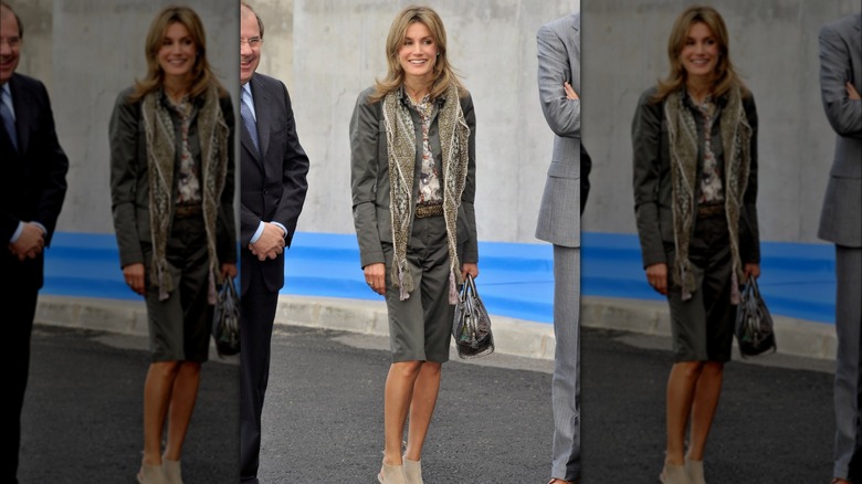 Princess Letizia in scarf, patterned shirt, black jacket and shorts