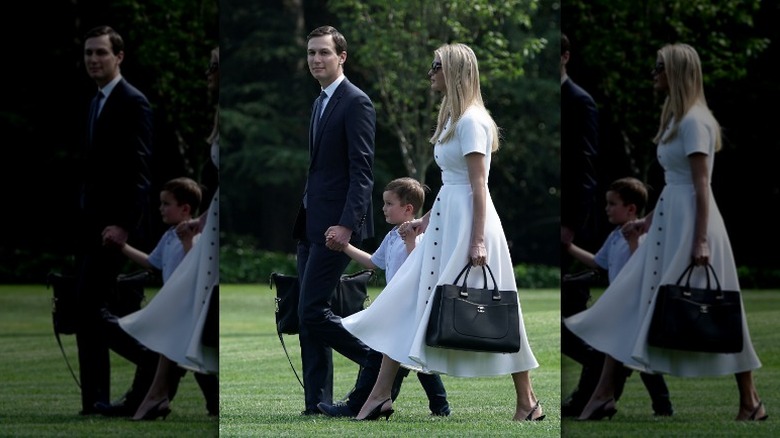 Ivanka Trump walking with her husband and son