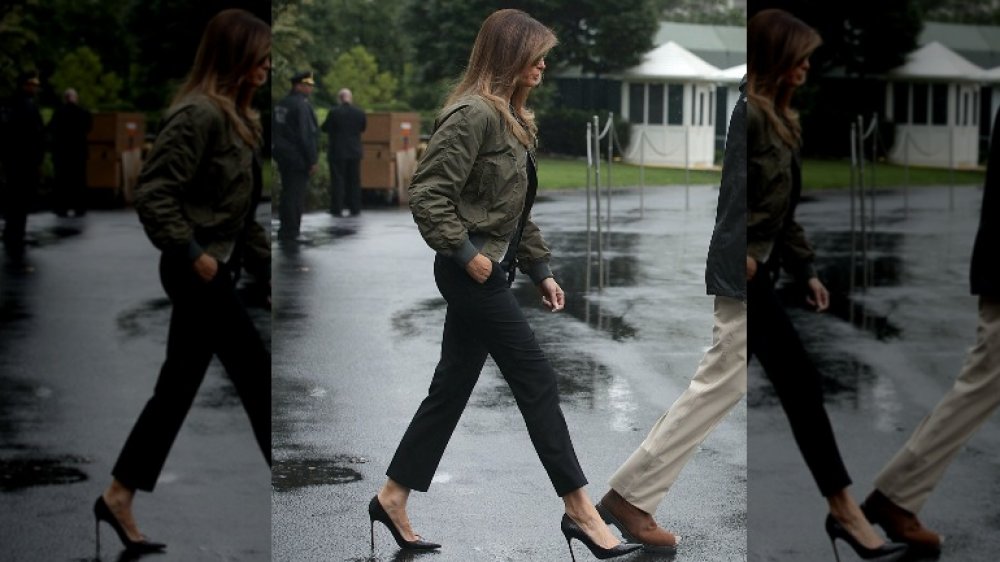 Melania Trump wearing stilettos, an inappropriate choice for a presidential family member for the occasion