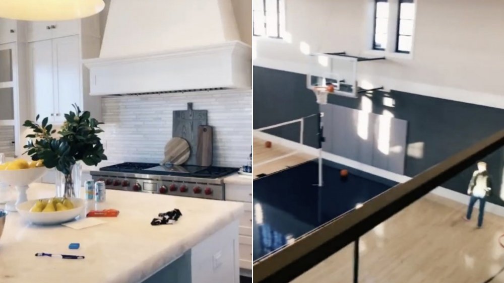 a TikTok home with a stunning kitchen and basketball court