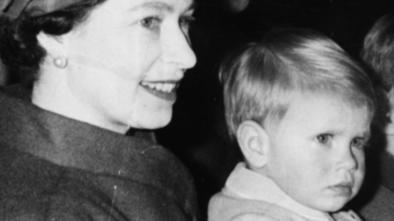 Prince Andrew sitting on Queen Elizabeth's lap 