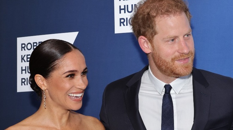 Duke and Duchess of Sussex smiling