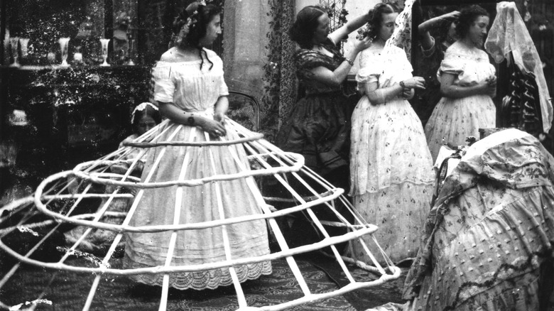 Women in hoop skirts