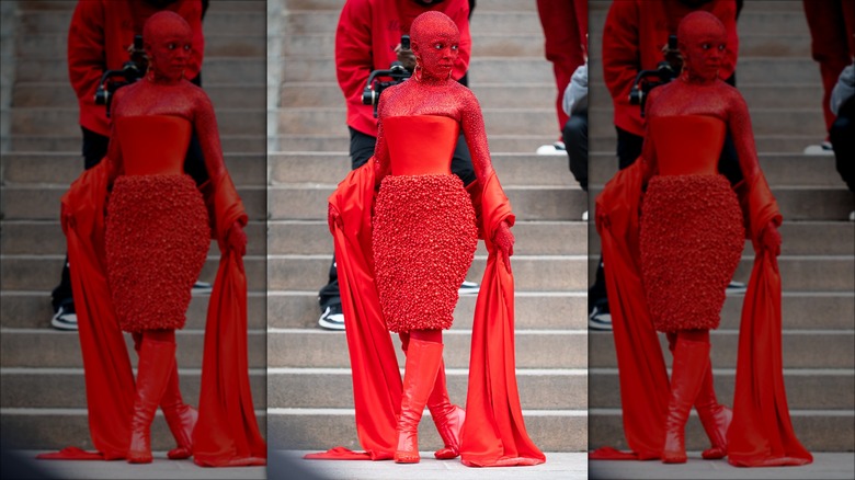 Doja Cat covered in red crystals 