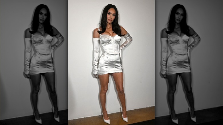 Megan Fox in white satin bustier dress