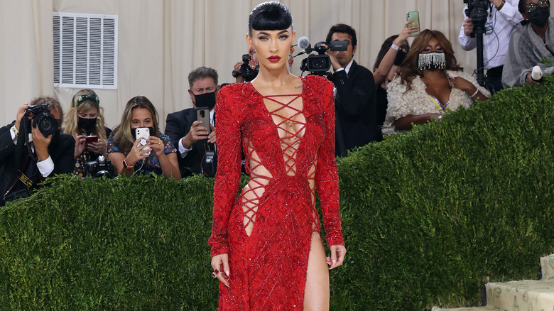 Megan Fox in red lace-up gown at 2021 Met Gala