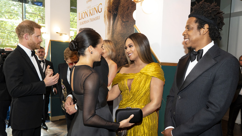 Meghan Markle, Prince Harry, Beyonce and Jay Z at an event 