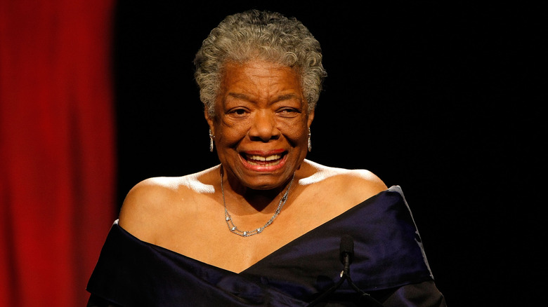 Maya Angelou speaks on stage
