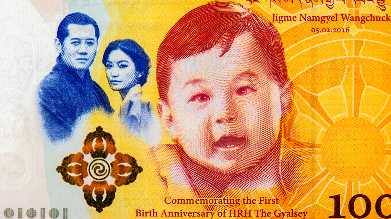 A Bhutan currency bill with an image of Gyalsey Jigme Namgyel