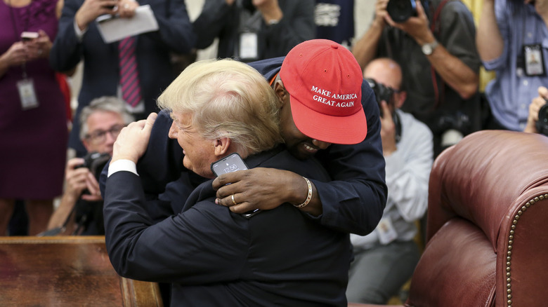 Kanye West hugging Donald Trump