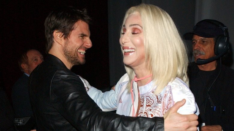 Tom Cruise and Cher smiling