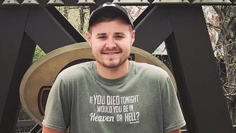 Jason Duggar in religious T-shirt