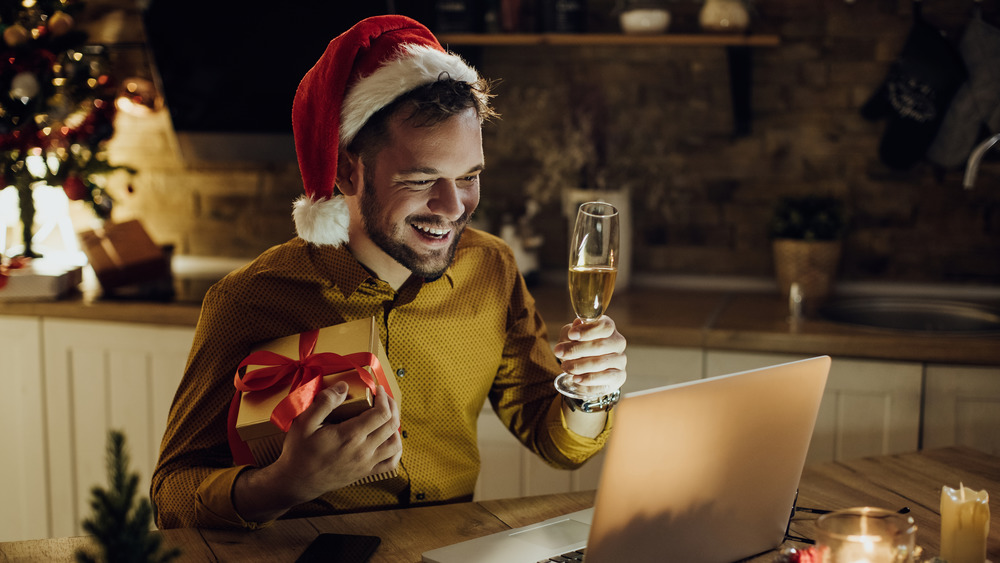 Man celebrating Christmas over the internet