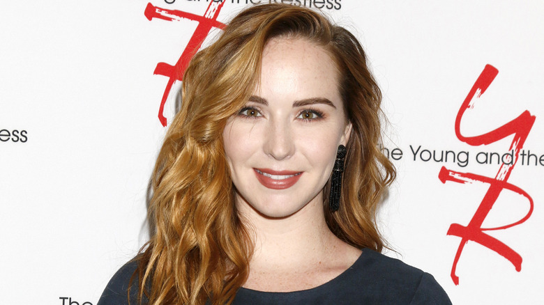 Camryn Grimes smiling at event