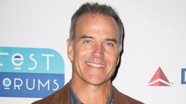 Richard Burgi smiling at event