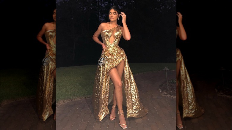 Kylie Jenner gold gown