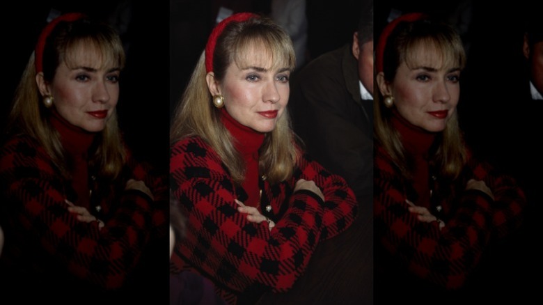 A mirrored image of Hillary Clinton dressed in red