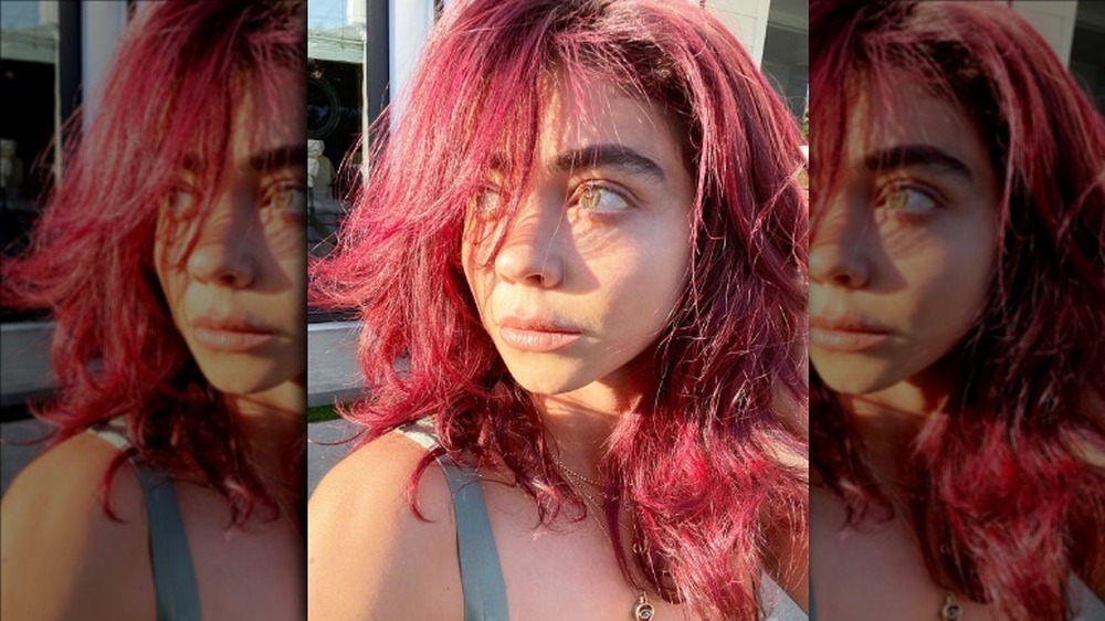 Sarah Hyland with bright pink hair