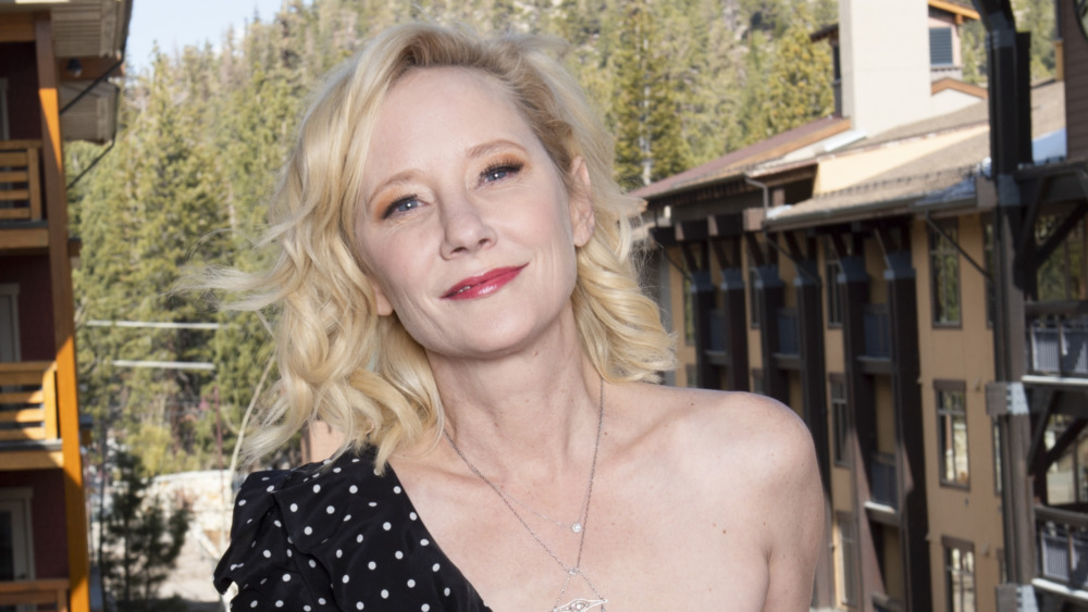 Anne Heche smiles at an event