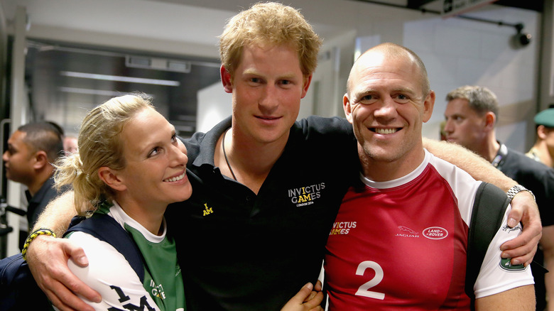 Prince Harry, Mike, and Zara Tindall smiling