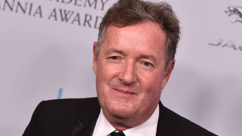 Piers Morgan posing  