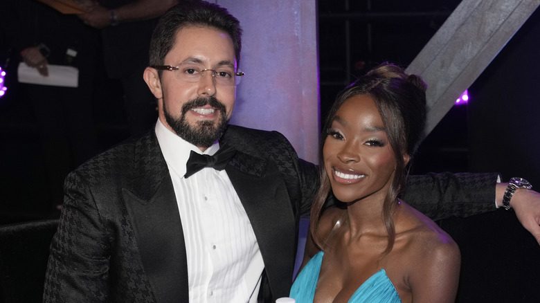 Jeff Lazkani and Chelsea Lazkani smie while posing for a photo at the 2022 MTV Movie & TV Awards: UNSCRIPTED