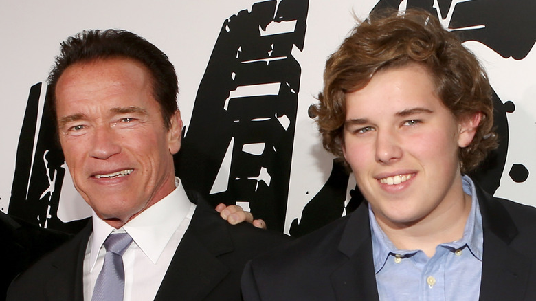 Arnold Schwarzenegger and his son Christopher smiling