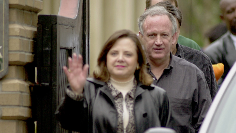 Patsy and John Ramsey looking at cameras