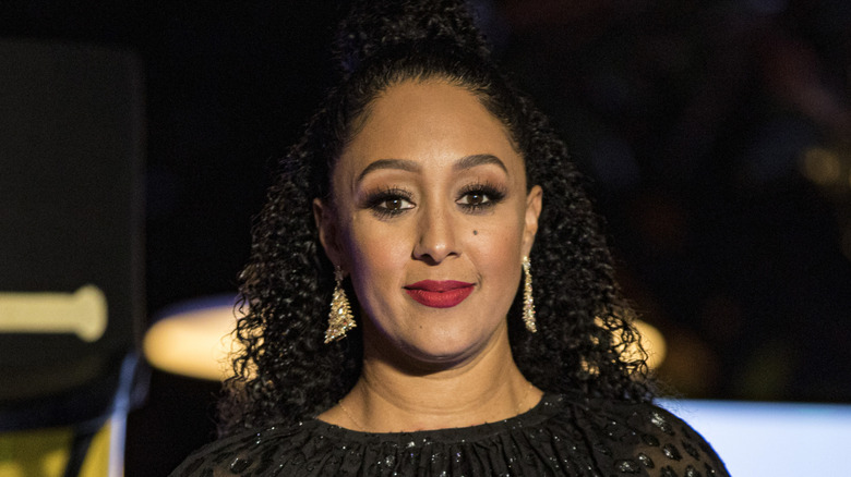 Tamera Mowry-Housley onstage at California Christmas event