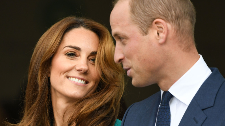 Kate Middleton and Prince William smiling at each other